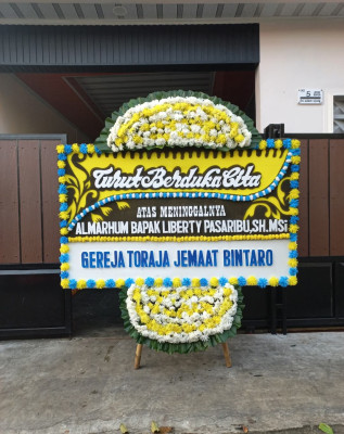 Papan Bunga Duka di Tewah